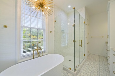 Designed by Robert Orr, this home is perfectly positioned on a - photo 28