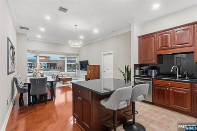 Luxury awaits in this 3-bedroom + bonus room, 2-bath penthouse