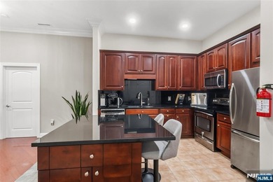 Luxury awaits in this 3-bedroom + bonus room, 2-bath penthouse