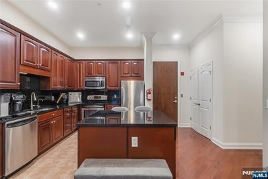 Luxury awaits in this 3-bedroom + bonus room, 2-bath penthouse