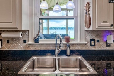Nestled on a beautifully private one-acre lot along the shores - photo 15