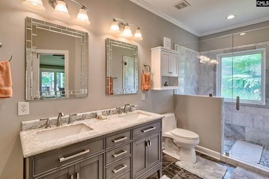 Nestled on a beautifully private one-acre lot along the shores - photo 21