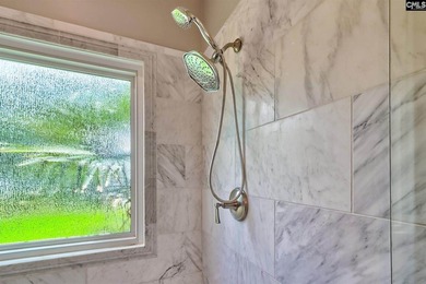 Nestled on a beautifully private one-acre lot along the shores - photo 22
