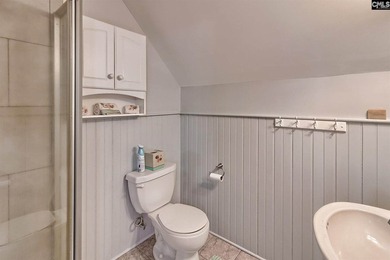 Nestled on a beautifully private one-acre lot along the shores - photo 25