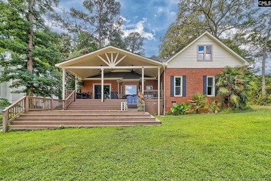 Nestled on a beautifully private one-acre lot along the shores - photo 33