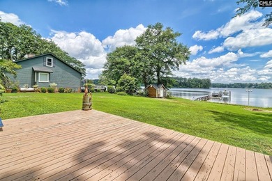 Nestled on a beautifully private one-acre lot along the shores - photo 35