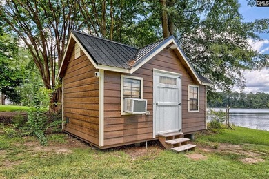 Nestled on a beautifully private one-acre lot along the shores - photo 37