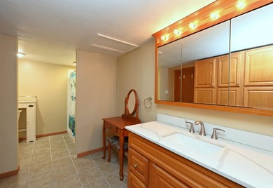 Experience the comfort of a home on Bruce Lake, where you can - photo 16