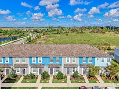 Own this practically brand-new townhome in the highly sought - photo 1