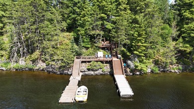 Escape to your own private slice of Rainy Lake paradise tucked - photo 2