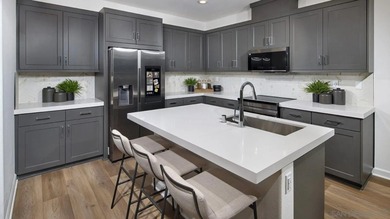 On the second floor of this brand-new three-story townhome, an - photo 3