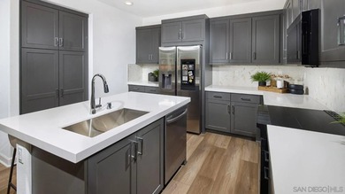 On the second floor of this brand-new three-story townhome, an - photo 4