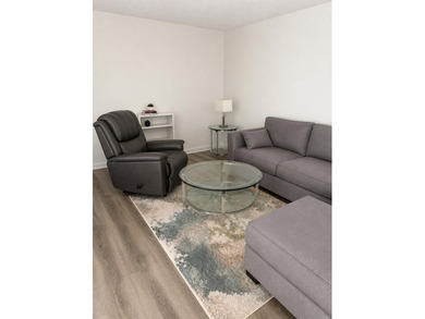 FIRST FLOOR CORNER GEM IN AN ACTIVE 55 + COMMUNITY !!! ENJOY - photo 1