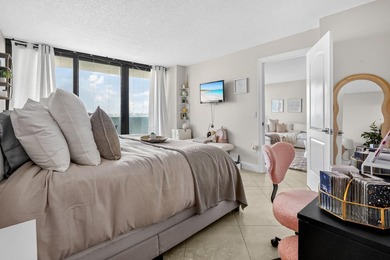 Experience coastal luxury in this gated condo at Palm Beach - photo 12