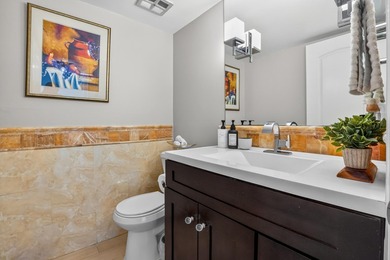 Experience coastal luxury in this gated condo at Palm Beach - photo 13