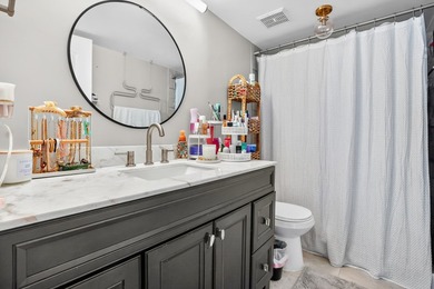 Experience coastal luxury in this gated condo at Palm Beach - photo 15