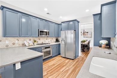 The kitchen's slate blue cabinetry is the kind of choice you - photo 16