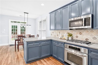 The kitchen's slate blue cabinetry is the kind of choice you - photo 17
