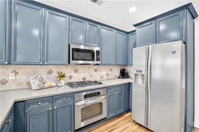 The kitchen's slate blue cabinetry is the kind of choice you - photo 18