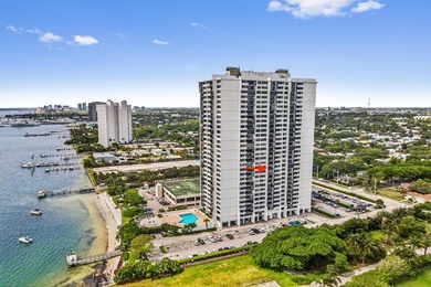 Experience coastal luxury in this gated condo at Palm Beach - photo 18