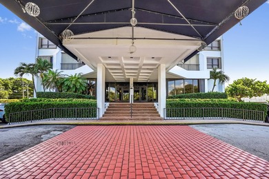 Experience coastal luxury in this gated condo at Palm Beach - photo 20