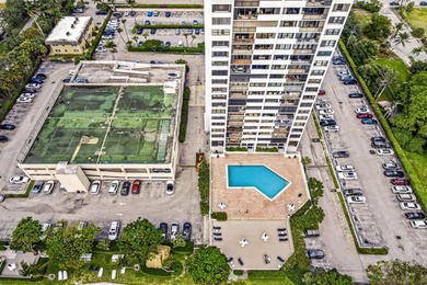 Experience coastal luxury in this gated condo at Palm Beach - photo 23