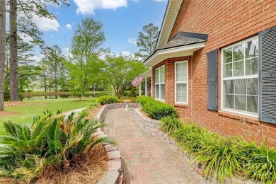 Welcome home to this stunning all-brick retreat featuring an