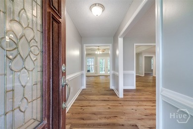 Welcome home to this stunning all-brick retreat featuring an