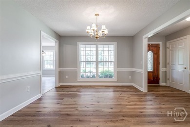 Welcome home to this stunning all-brick retreat featuring an