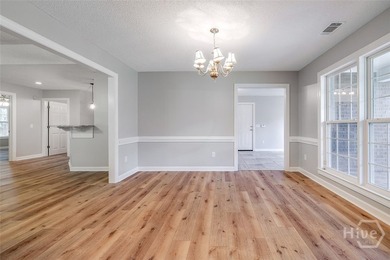 Welcome home to this stunning all-brick retreat featuring an