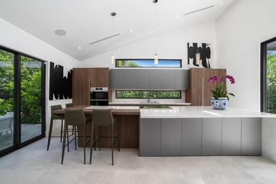 Set on a 9,345+/- square-foot lot, this SoSo residence combines - photo 6