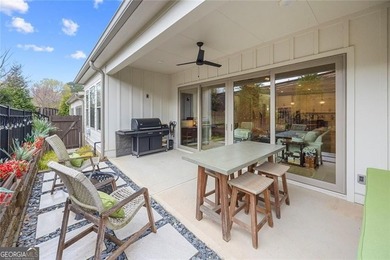 Tucked in the heart of Bridgemill, this luxury townhome lives - photo 11