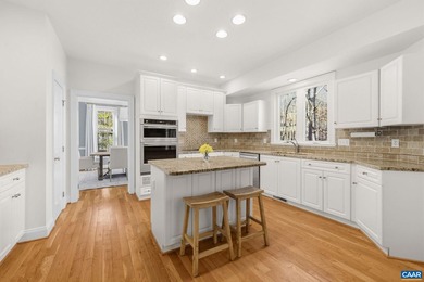 Located in desirable Glenmore, this four bedroom, three and a - photo 15