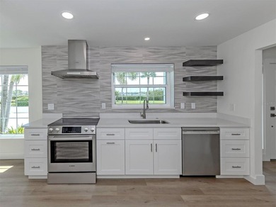 Virtually Staged. A boater's paradise, this beautiful, fully - photo 5