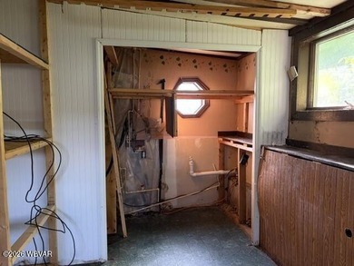This property is now under auction terms. All Bids must be - photo 16
