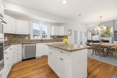 Located in desirable Glenmore, this four bedroom, three and a - photo 17
