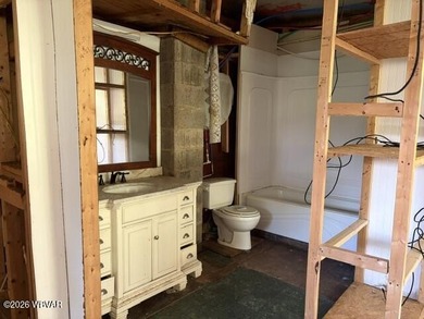 This property is now under auction terms. All Bids must be - photo 17
