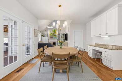 Located in desirable Glenmore, this four bedroom, three and a - photo 18