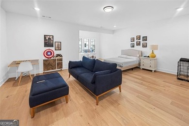 Tucked in the heart of Bridgemill, this luxury townhome lives - photo 20