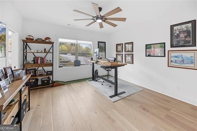 Tucked in the heart of Bridgemill, this luxury townhome lives - photo 27