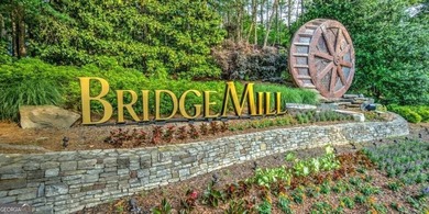 Tucked in the heart of Bridgemill, this luxury townhome lives - photo 34