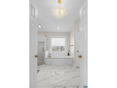 Located in desirable Glenmore, this four bedroom, three and a - photo 36