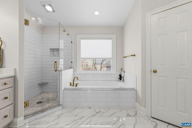 Located in desirable Glenmore, this four bedroom, three and a - photo 37
