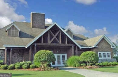 Tucked in the heart of Bridgemill, this luxury townhome lives - photo 41