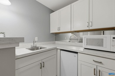 Located in desirable Glenmore, this four bedroom, three and a - photo 49