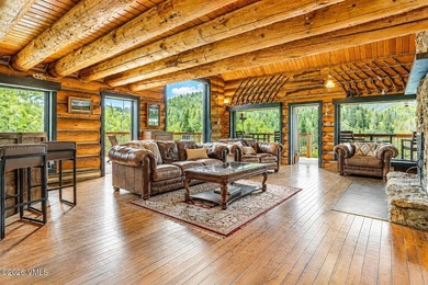 Tucked at the end of the road, this exceptional mountain estate - photo 12