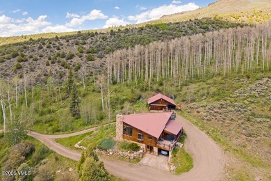 Tucked at the end of the road, this exceptional mountain estate - photo 29