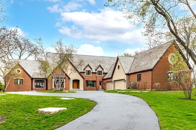 Welcome to an extraordinary all-brick estate in the prestigious - photo 1