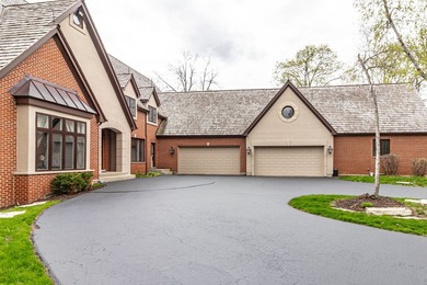 Welcome to an extraordinary all-brick estate in the prestigious - photo 2
