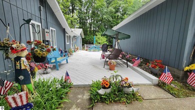 Enjoy peaceful lake living in this beautifully maintained - photo 6